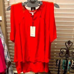 Juicy Couture size large women’s orange blouse